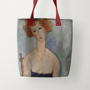 Red Headed Woman Wearing a Pendant